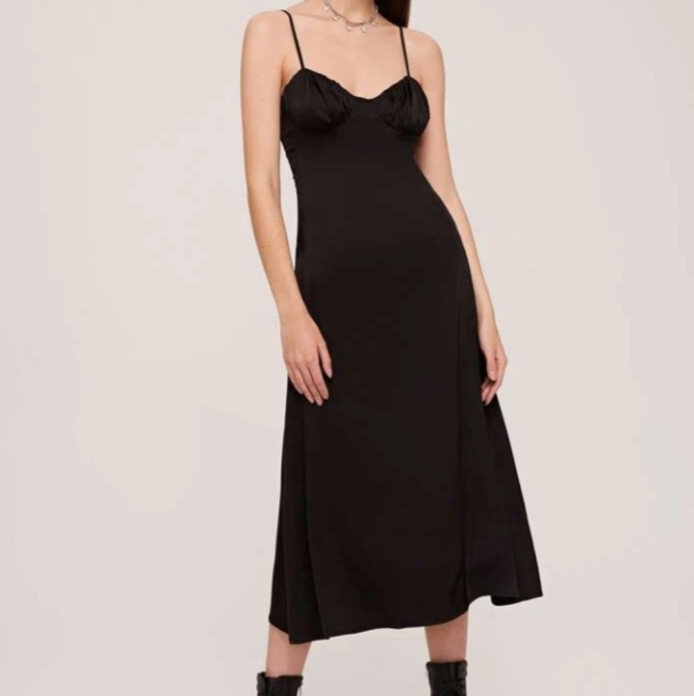 A black silky dress